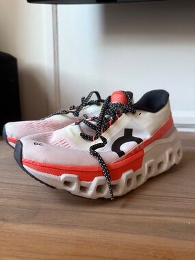 On Running Women's White and Coral Cloudmonster Athletic Shoes